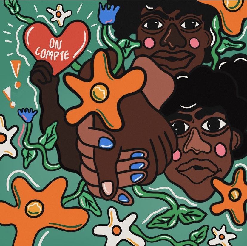 Two black characters faces and a close up of black holding hands. There is another hand in the back that is holding a heart shaped sign that reads “On Compte” meaning, “We Matter”. There are orange, blue and white flowers on the image.